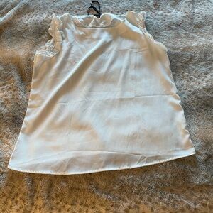 Sleeveless white blouse by CEST LA VIE